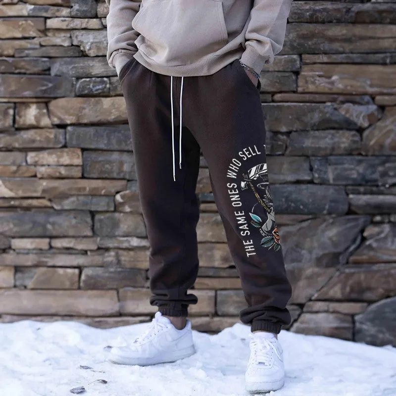 The Same Ones Who Sell The Panic Sell The Cure GRAPHIC PRINT JOGGERS